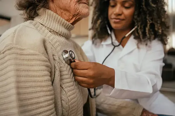 A woman waiting in a hospital