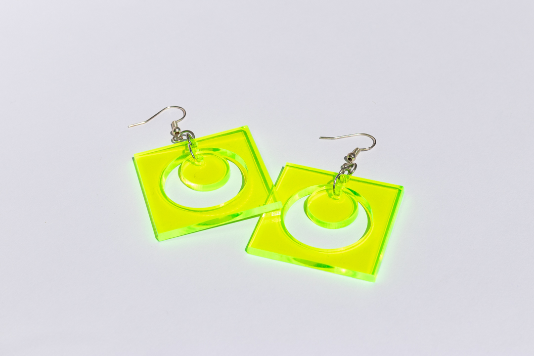 green cutout/circle earrings