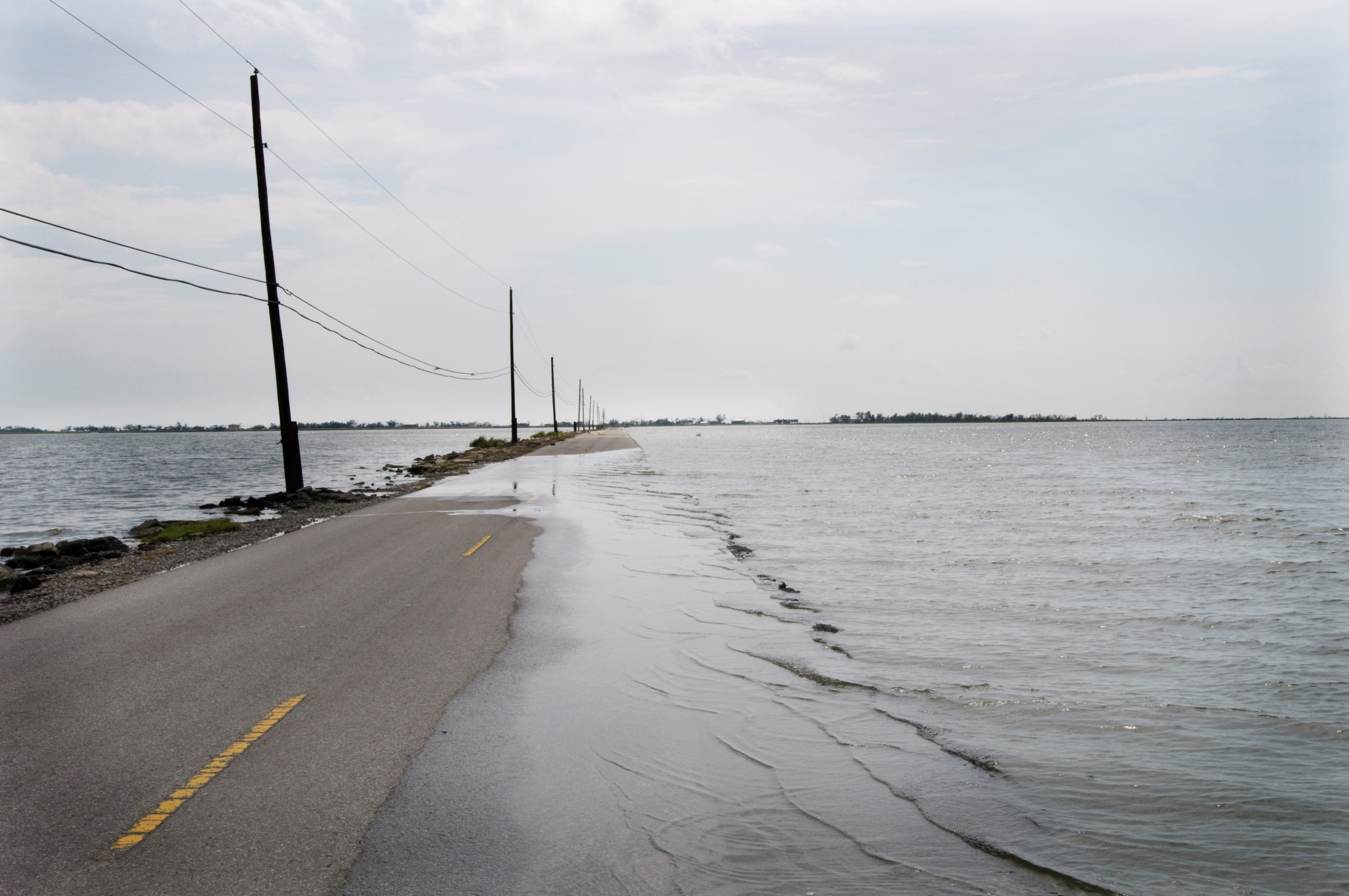 Flooded road leading into Isle de Jean Charles