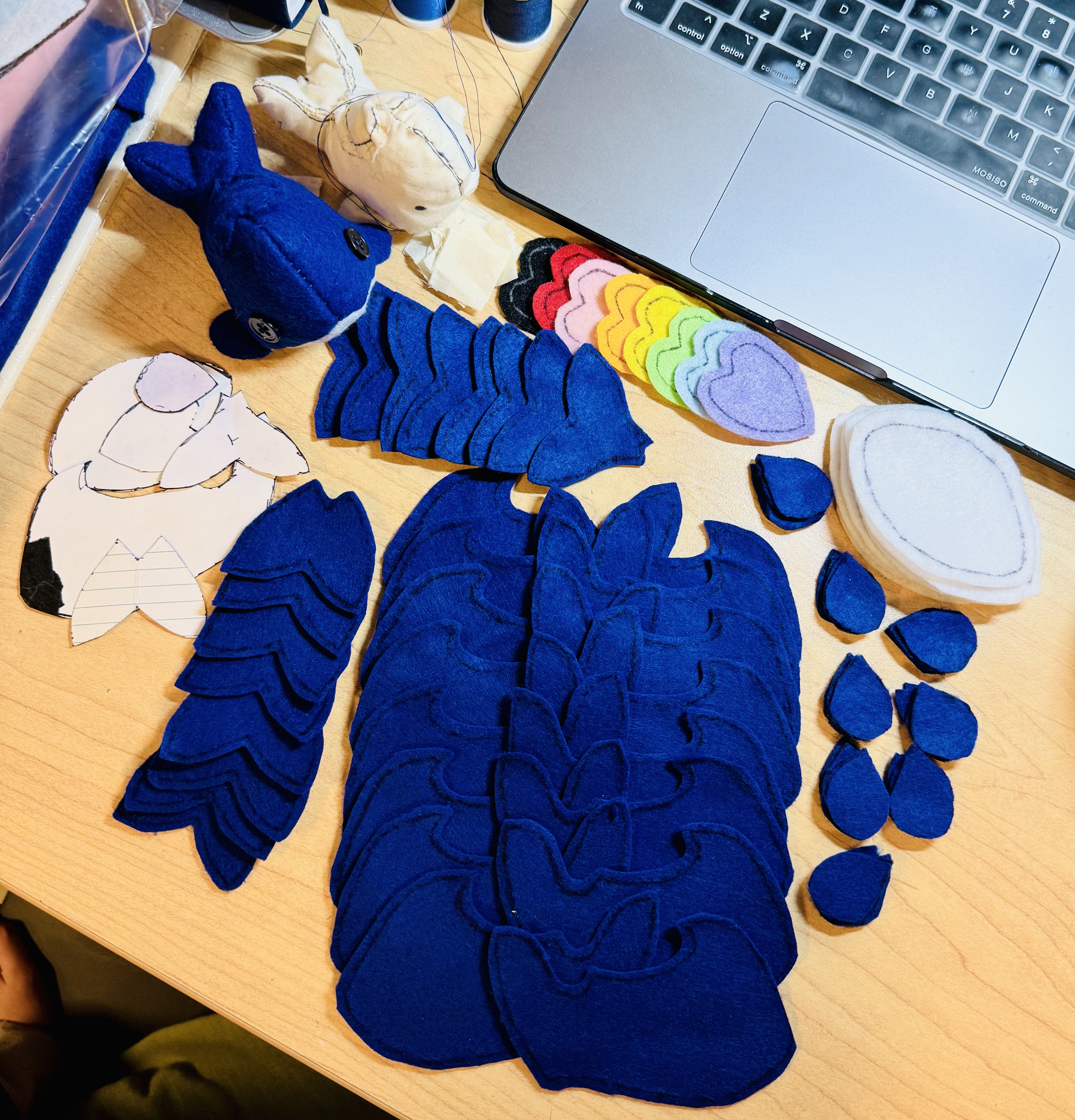 Pre-cut materials for making 8 whales